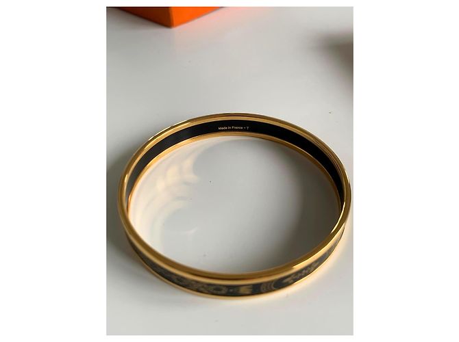 Bracciale rigido Hermès in metallo dorato e smalto nero Gold hardware - vista 2