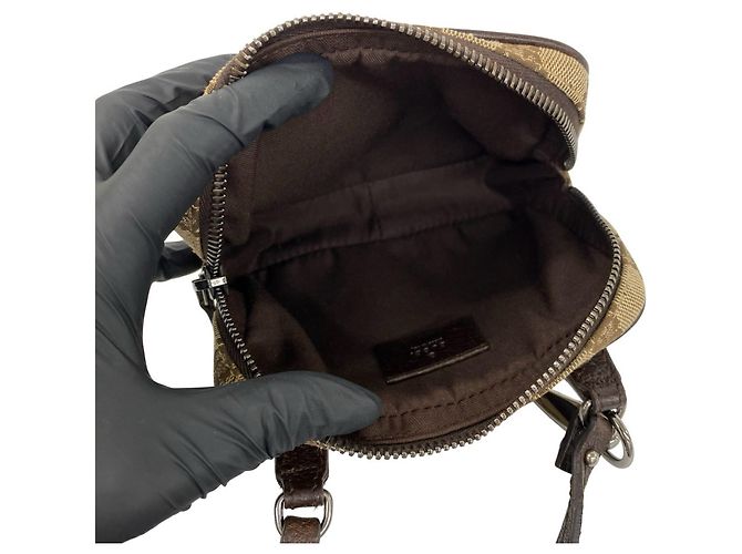 Mini borsa a tracolla in pelle e tela con motivo GG Logo Gucci Marrone - vista 9
