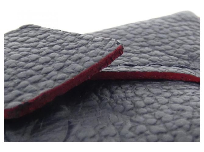 Louis Vuitton Monogram Empreinte Pochette Cosmetic Handbag Rosso - vista 4
