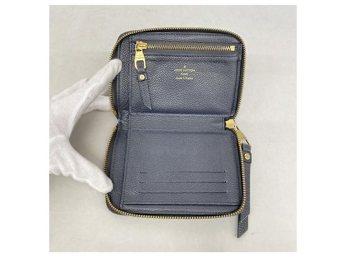 Louis Vuitton Monogram Empreinte Portefeuille Secret Compact Wallet - vista 3