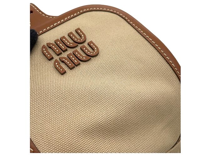 Mochila e bolsa Miu Miu em couro e lona bege e marrom - vista 7