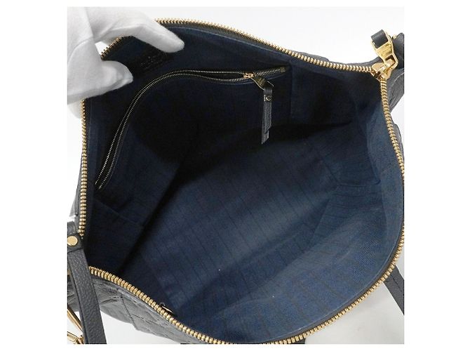 Bolso Tote Louis Vuitton Monogram Empreinte Lumineuse PM - vista 4