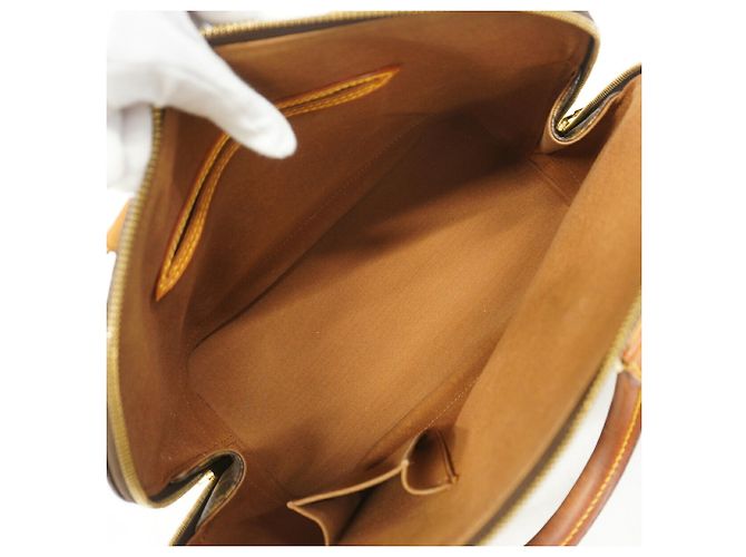 Bolso de mano Louis Vuitton Alma Monogram M51130 Castaño - vista 4