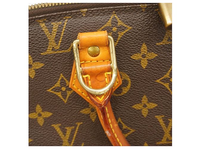 Bolso de mano Louis Vuitton Alma Monogram M51130 Castaño - vista 7