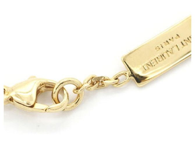Autre Marque Bracciale con ciondolo Saint Laurent Cassandra D'oro - vista 3