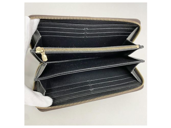 Cartera Zippy Louis Vuitton Monogram Giant Reverse Castaño - vista 3