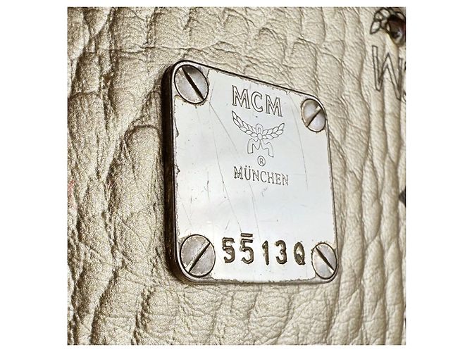 Sac à dos MCM en cuir noir et doré - vue 13