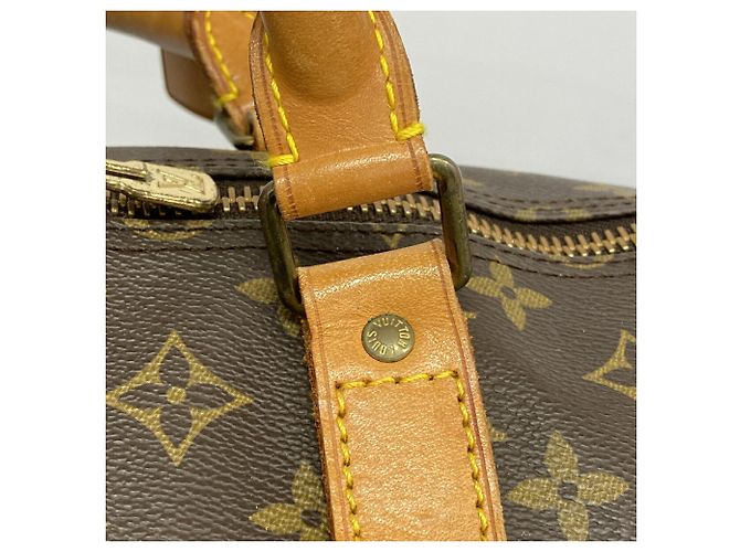 Louis Vuitton Boston Monogram Keepall Bandoulière 60 Castaño - vista 13