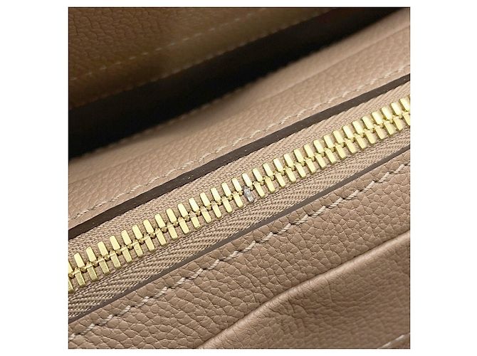 Bolsa Louis Vuitton Monogram Empreinte Vosges MM Taupe - vista 13