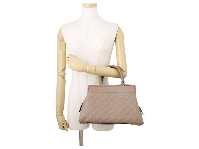 Bolsa Louis Vuitton Monogram Empreinte Vosges MM Taupe - vista 4