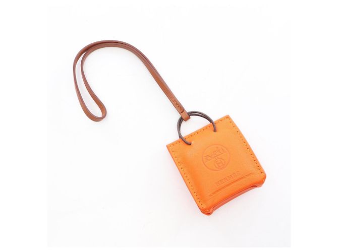 Charm Hermès per borsa in pelle Agneau Milo marrone rosso oro arancio D'oro Arancione - vista 2
