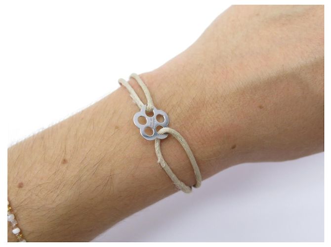 BRACCIALE DINH VAN CORDON FLEUR BUBBLES ORO BIANCO 18K 1.6GR + 5 CORDINI Argento - vista 10