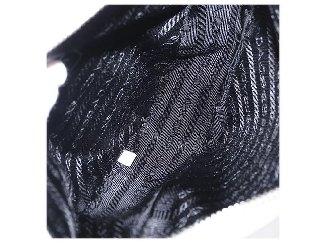 Pochette Prada con logo Triangle in pelle goffrata Bianco - vista 5