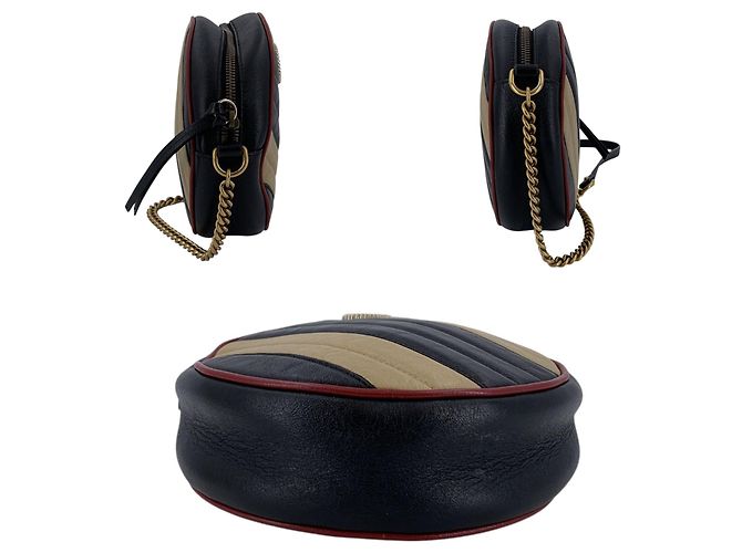 Gucci Borsa a tracolla rotonda GG Marmont in pelle matelassé a righe nero e beige - vista 4