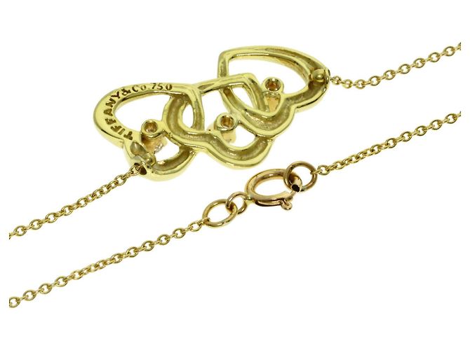 Autre Marque Collana Tiffany & Co. Triple Heart in Oro Giallo 18K e Diamanti - vista 2