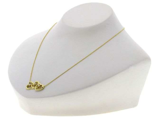Autre Marque Collana Tiffany & Co. Triple Heart in Oro Giallo 18K e Diamanti - vista 4