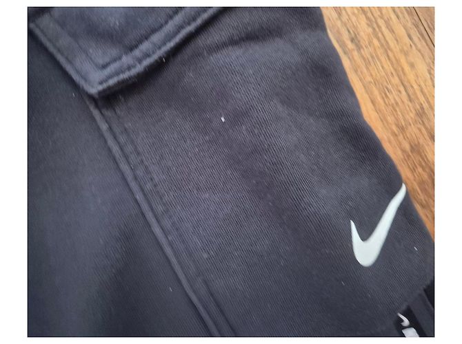 Nike Pantaloni Cargo Jogger Uomo con Strisce Logo - Nero - vista 4
