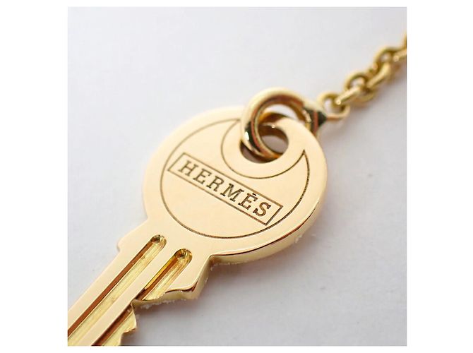Charm para bolso Hermès 750 en oro amarillo - vista 3