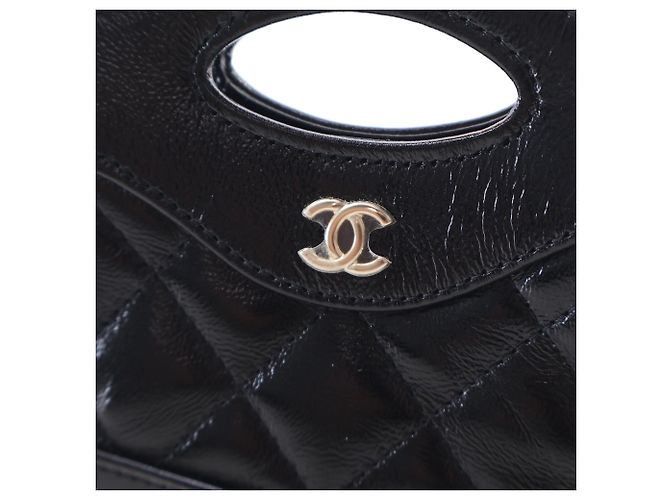 Chanel Clutch 31 con Catena in Lambskin Lucido Nero - vista 11