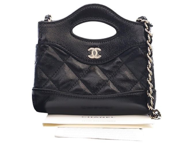 Chanel Clutch 31 con Catena in Lambskin Lucido Nero - vista 13