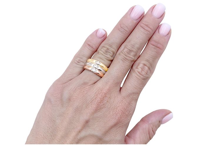 Anello Cartier, "Ellipse", tre ori e diamanti. - vista 5