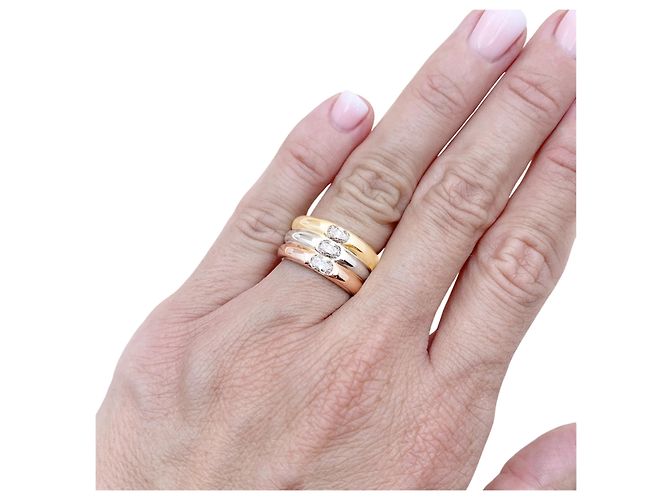 Anello Cartier, "Ellipse", tre ori e diamanti. - vista 6