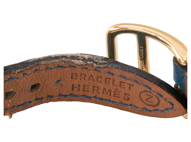 HERMÈS - Relógio Kelly Hermès em banho de ouro e couro grão azul - vista 7