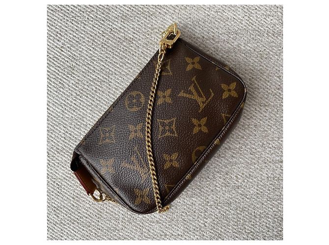 Louis Vuitton Mini Pochette Accessoires Monogram Marrom - vista 8