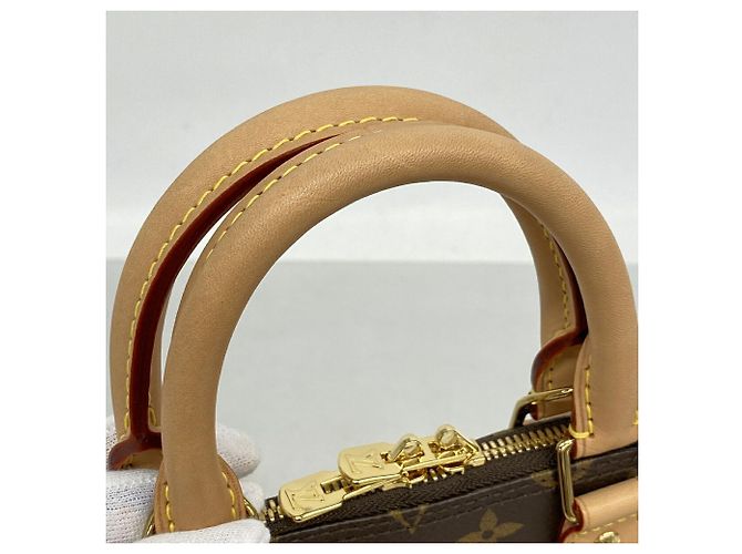 Bolsa Louis Vuitton Alma BB Monogram Marrom - vista 6