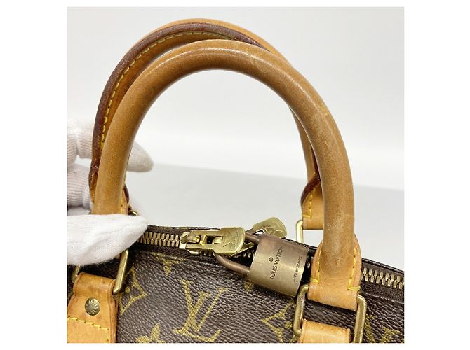 Bolsa Louis Vuitton Alma Monogram Marrom - vista 8