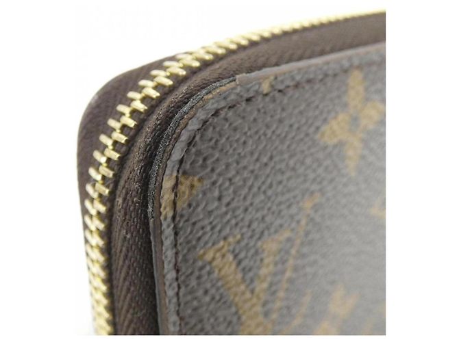 Louis Vuitton Monogram Zippy Wallet M41895 Castaño Fucsia - vista 4