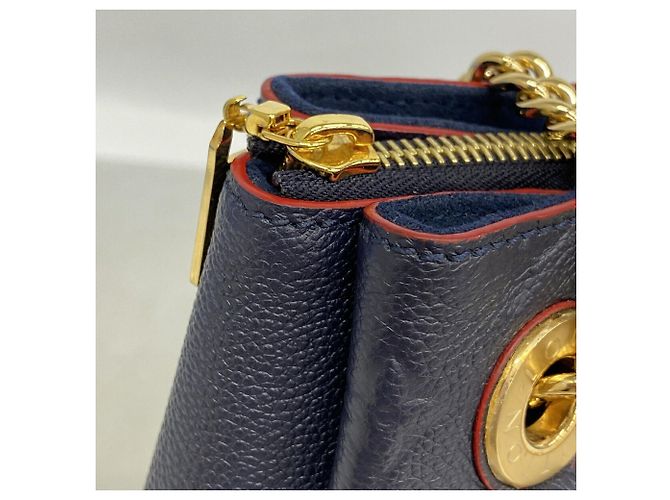 Bolso Tote Louis Vuitton Monogram Empreinte Surenne MM Roja - vista 7