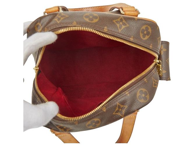 Bolso Louis Vuitton Monogram Exantry Cite Castaño - vista 9