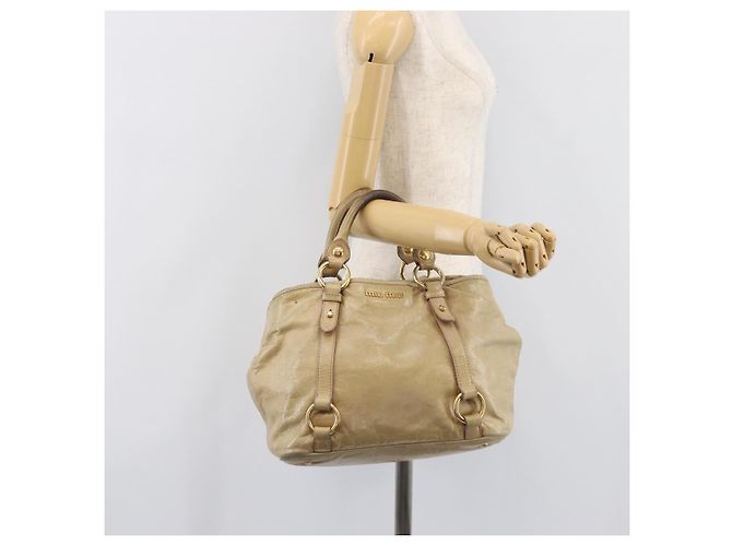 Borsa a mano Miu Miu in pelle beige tono oro Auth 167591A - vista 28