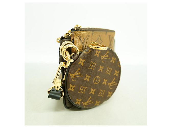 Bolso Louis Vuitton Monogram Giant Reverse Pochette Trio Castaño - vista 2