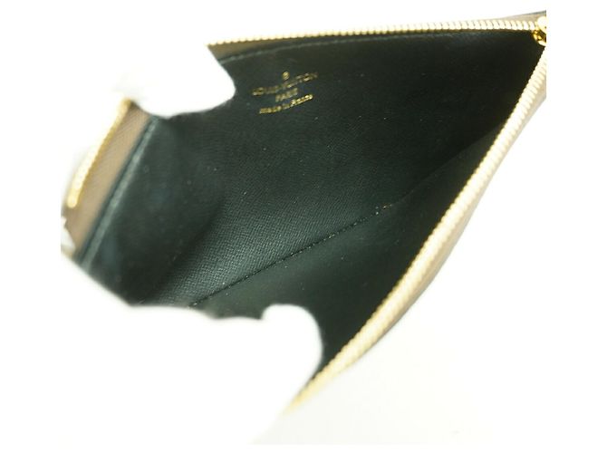 Bolso Louis Vuitton Monogram Giant Reverse Pochette Trio Castaño - vista 3