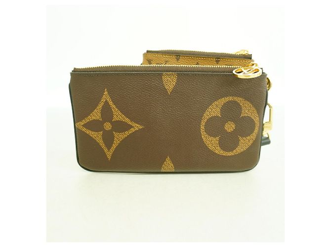 Bolso Louis Vuitton Monogram Giant Reverse Pochette Trio Castaño - vista 7