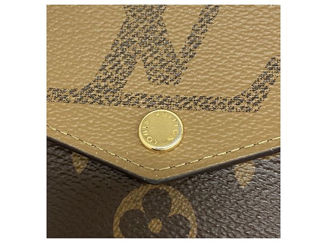 Louis Vuitton Monogram Giant Reverse Portefeuille Sarah Long Wallet Marrone - vista 8