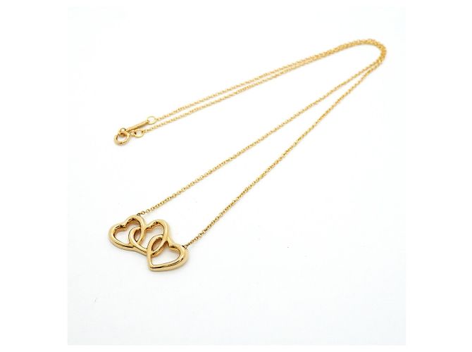 Autre Marque Collana Triple Heart di Tiffany & Co. in oro giallo 18K - vista 3