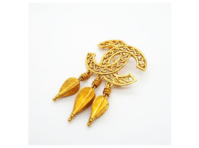 Broche Chanel chapado en oro con marca Coco Dorado - vista 2