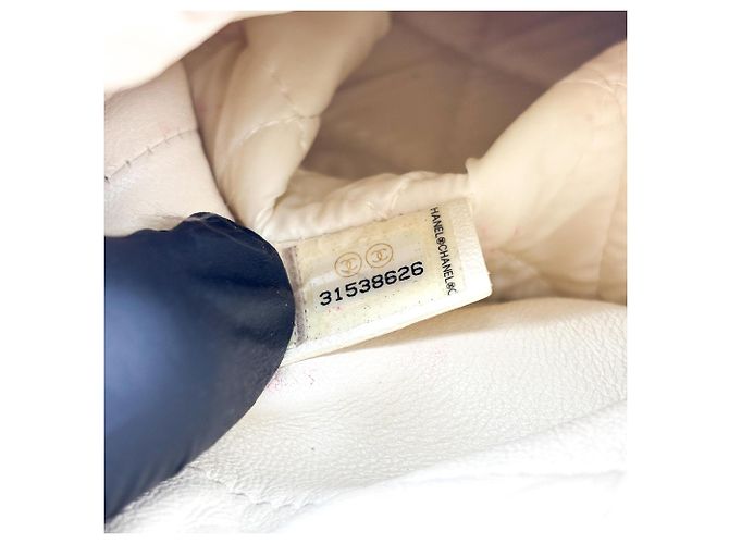 Borsa a secchiello Chanel con coulisse e catena in pelle d'agnello matelassé Mini D'oro - vista 7