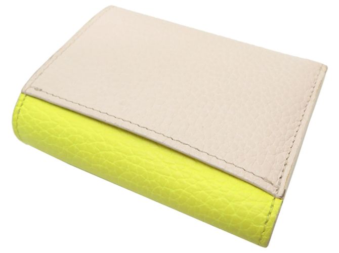 Louis Vuitton Portefeuille Capucines XS Tri-fold Wallet Beige Giallo - vista 4