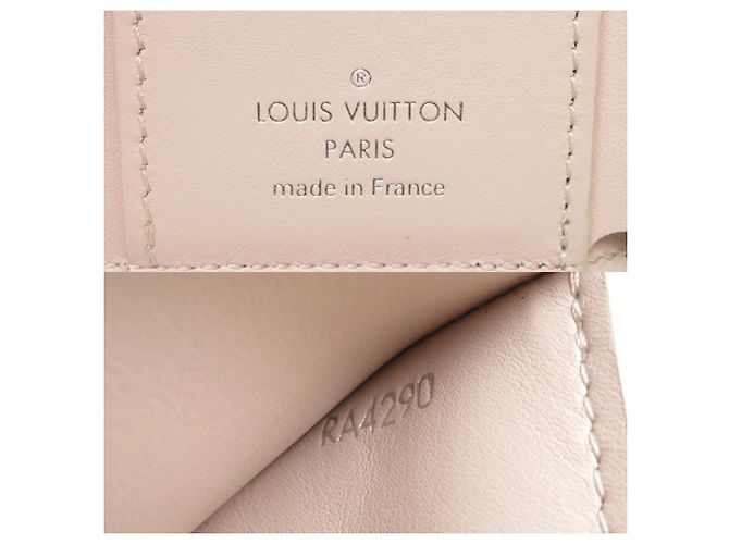 Louis Vuitton Portefeuille Capucines XS Tri-fold Wallet Beige Giallo - vista 8