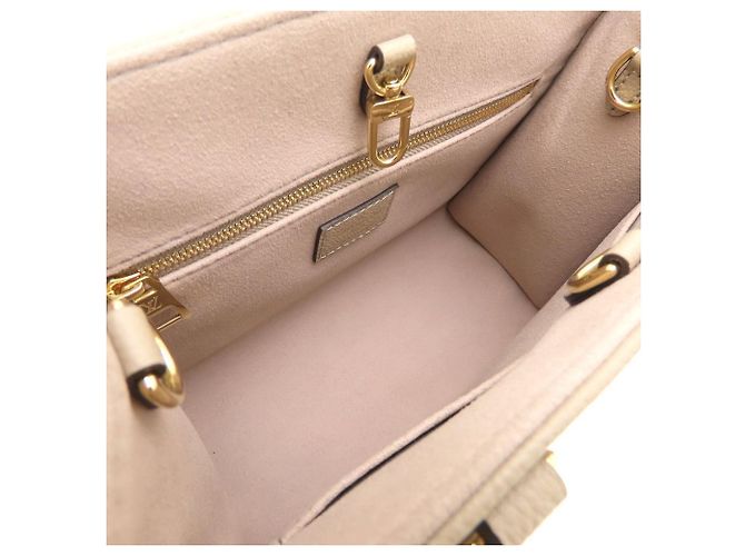Borsa Louis Vuitton OnTheGo PM Bicolor Monogram Empreinte Multicolore Monogramma - vista 7