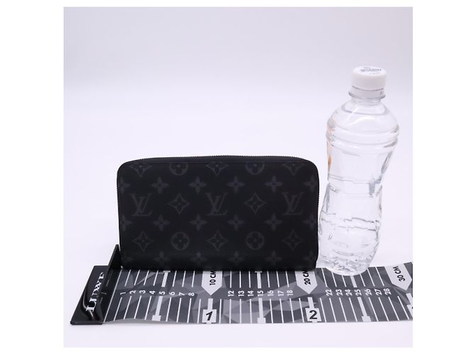 LOUIS VUITTON Monogram Eclipse Zippy Organizer Long Wallet Marrom Preto - vista 3