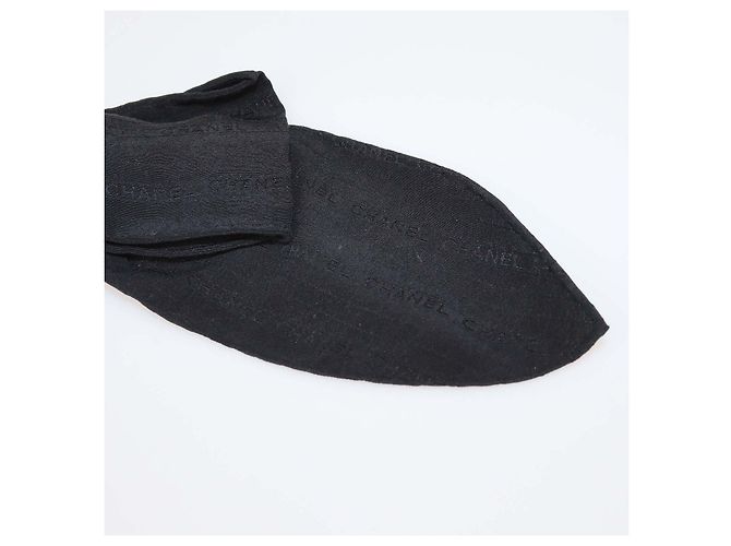 Fermi capelli Chanel in tessuto nero con fiocco - vista 4