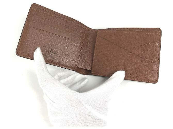 Louis Vuitton Monogram Bi-Fold Wallet Brown - view 9