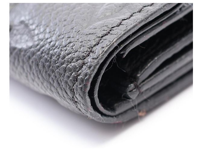 Louis Vuitton Portefeuille Zoe Monogram Empreinte Noir Tri-fold Wallet Nero - vista 10