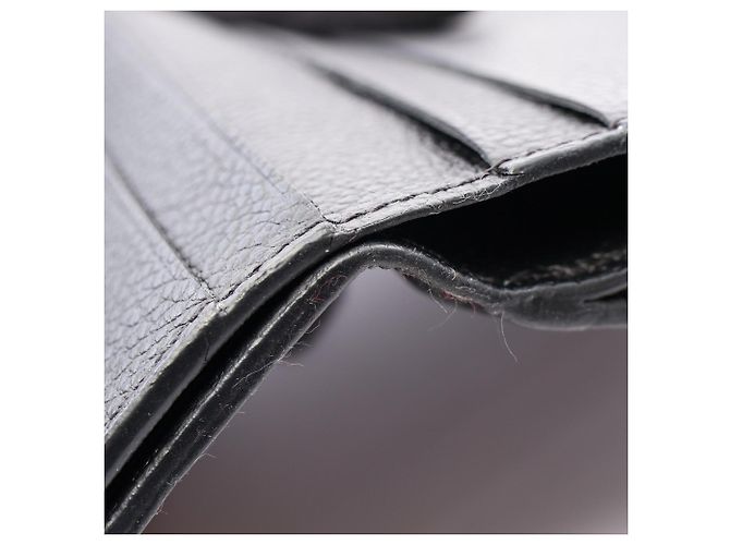 Louis Vuitton Portefeuille Zoe Monogram Empreinte Noir Tri-fold Wallet Nero - vista 7