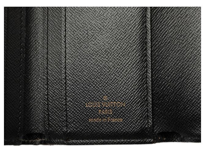 Louis Vuitton Monogram Giant Reverse Portefeuille Zoe Tri-fold Wallet Castaño Monograma - vista 5